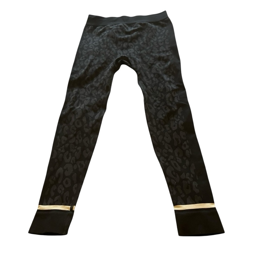 Sweaty Betty leggings with black printed design size 8